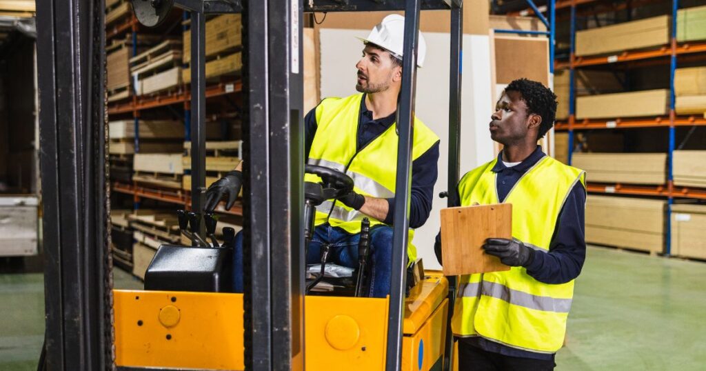 skillslearning 2 | Pathways Career College Two men working on a forklift in a warehouse